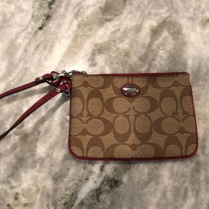 Coach tan / red leather wristlet